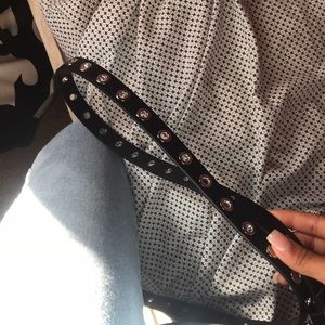 Black and silver grommet belt